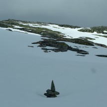 1564 meters high Søre Tinden seen in a hole of the clouds